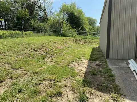 Before the work: block steps along a gravel pad