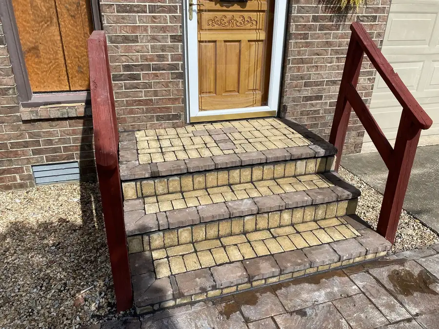 Paver steps with a railing at a front door, Sparta, MO
