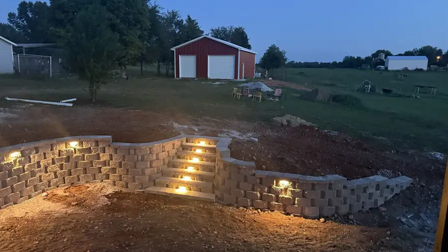 Block retaining wall with built-in steps and lighting, Ozark, MO